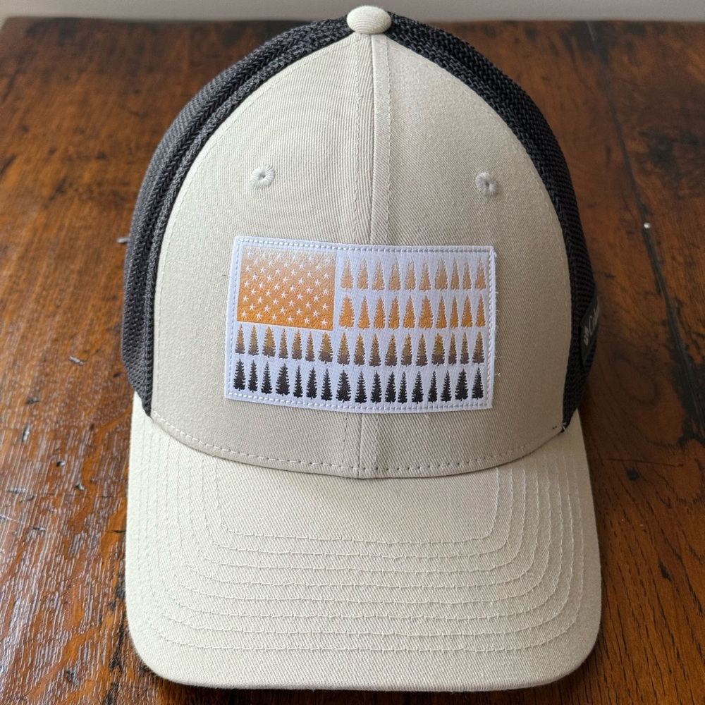 Beige and Black Columbia tree hugger Hat with Graphic Patch